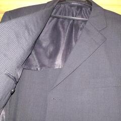 黒の紳士スーツの画像