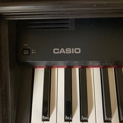 電子ピアノ　CASIO 椅子付きの画像