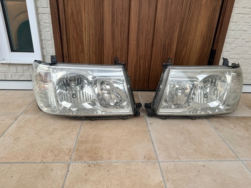 ランクル100 トヨタ純正後期ヘッドライト左右セット