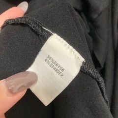 Kenneth Cole トップスの画像