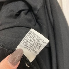 Kenneth Cole トップスの画像