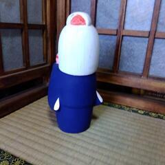 セトモノの人形の画像
