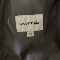 ラコステ 黒ジャンパーの画像