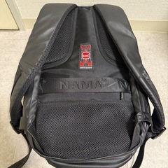 赤いバッグ プラスチック　リュックの画像