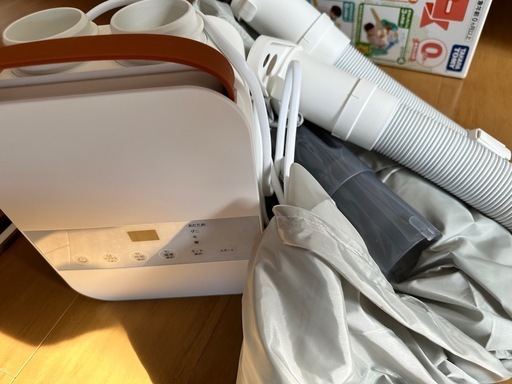 布団乾燥機　服用付き　　お話し中
