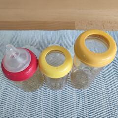 さく乳器、哺乳瓶、よだれカバーの画像