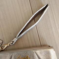 未使用COACHのポーチ クランチバッグの画像