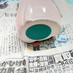ピンクの猫の貯金箱の画像