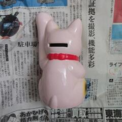 ピンクの猫の貯金箱の画像