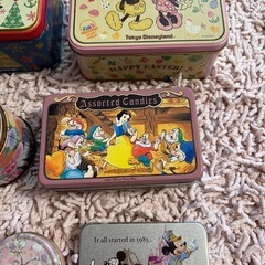 空き缶 TDL ミッキーマウス ディズニー 7個セット　楕円形(内側にサビあり)の画像