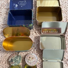 空き缶 TDL ミッキーマウス ディズニー 7個セット　楕円形(内側にサビあり)の画像