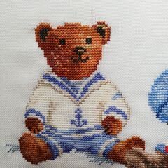 くまクロスステッチ作品　額入り　20☓36.5cmの画像