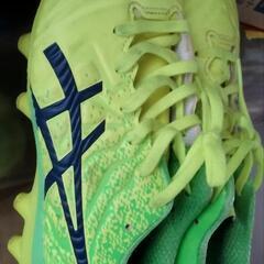 *ASICS。サッカー。スパイクの画像
