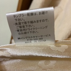 女性のコートの画像