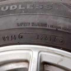 スタッドレスタイヤ14インチホイール付きの画像