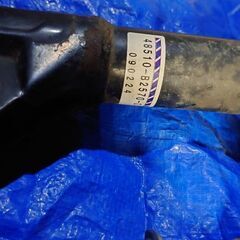 L275ミラの純正サスペンションのスプリングとダンパーの画像