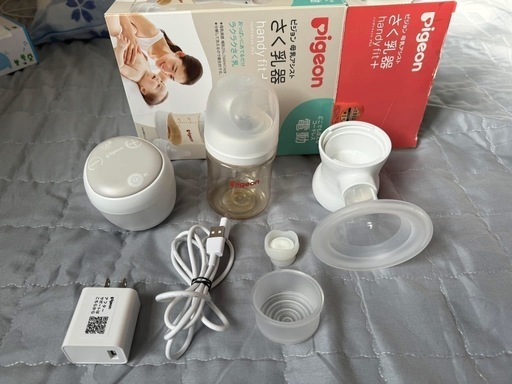 自動搾乳器
