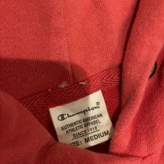 チャンピオン Champion フード付スウェットワンピ 前面プリントの画像