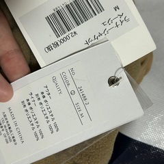 新品タグ付きアウターの画像