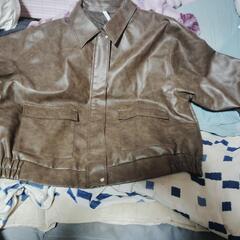 皮のジャケットこげ茶色