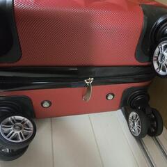 赤いSサイズキャリーバッグの画像