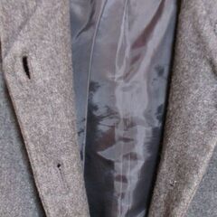 グレーのコート・フード付きコートの画像