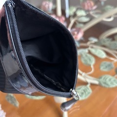 renomaストライプ ポーチ 黒　内側布張り 10×15×マチ5センチの画像