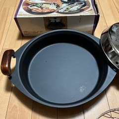 値下げ、未使用レトロな焼く、蒸す、煮るの万能鍋の画像