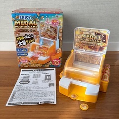 メダルプッシャーゲーム