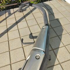 ヤマハYBR125の純正マフラーの画像