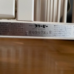 お話中 木製　ベビーベッドの画像