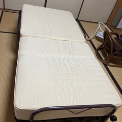 折りたたみベッドの画像