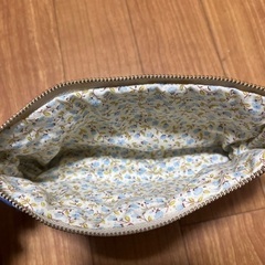31日までに問い合わせがない場合、処分します。ポーチの画像