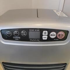 石油ストーブ ポリタンク付きの画像
