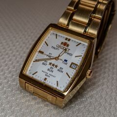 ORIENT オリエント 機械式 自動巻き アナログ 腕時計 ステンレス ゴールド 金 ヴィンテージ 部品あり カレンダー機能あり レア品 防水の画像