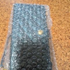 　新品　スマホ手帳型カバーの画像