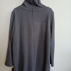 タグ付き新品のコートの画像