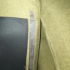 深緑色のソファーの画像