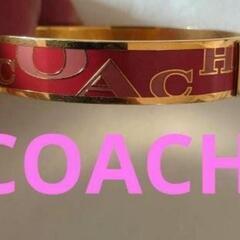 COACH ロゴ入りピンクゴールドバングル