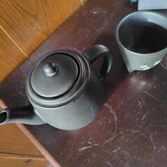 黒猫のティーカップセットの画像