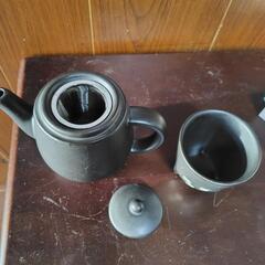 黒猫のティーカップセットの画像