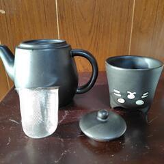 黒猫のティーカップセットの画像