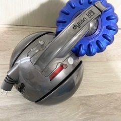 Dyson（ダイソン）掃除機➕コマ付き収納ケースの画像