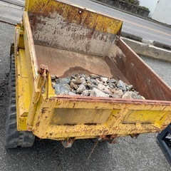 排土板付きダンプ運搬車の画像