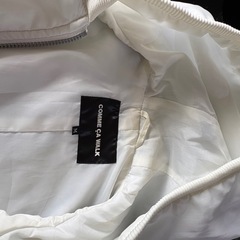 フード付きベストの画像