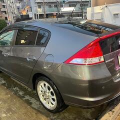 ホンダインサイト  2009 ＬＳ　ハイブリッド　ＴＶナビ　ＥＴＣ　ＦＯＧ　ＨＩＤ　ｉＰＯＤ　ＵＳＢ　ＤＶＤ　ＭＰ３　バックカメラ　アルミ付き　キーレス　ハンドルスイッチ　コーナーセンサーの画像