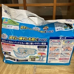 大人用紙おむつ22枚/敷きパッド3枚の画像