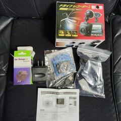 値下げしました。未使用品ドライブレコーダーと新品未使用品100ボルトからシガーソケット12ボルト　セット　雨の当たらない所に取り付けで防犯カメラにいかがでしょうか?　工夫して取り付けてみては？　防犯カメラは高額のためこちらで代用しようと思いましたが出品します。1セットは映像動作確認して売れました。の画像