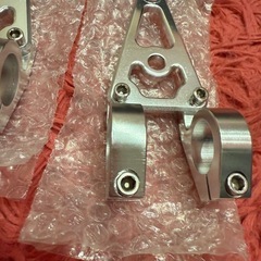 ヘッドライトブラケットφ26アルミ製CNC の画像