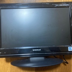 掃除機、テーブル、テレビ、テレビ台の画像